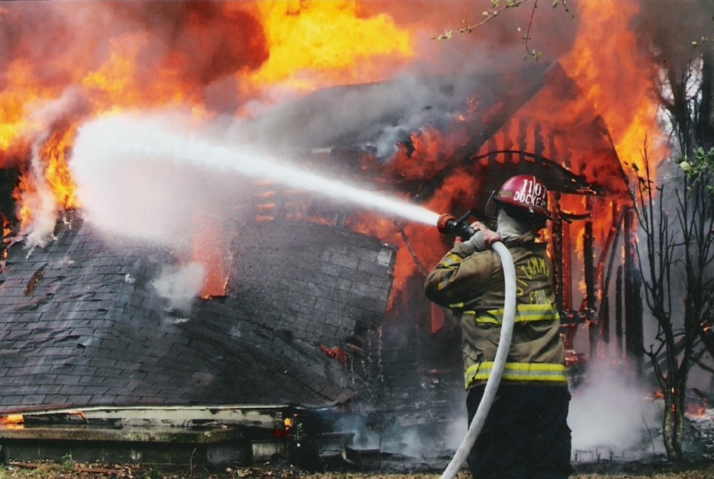 firefighter putting out a fire